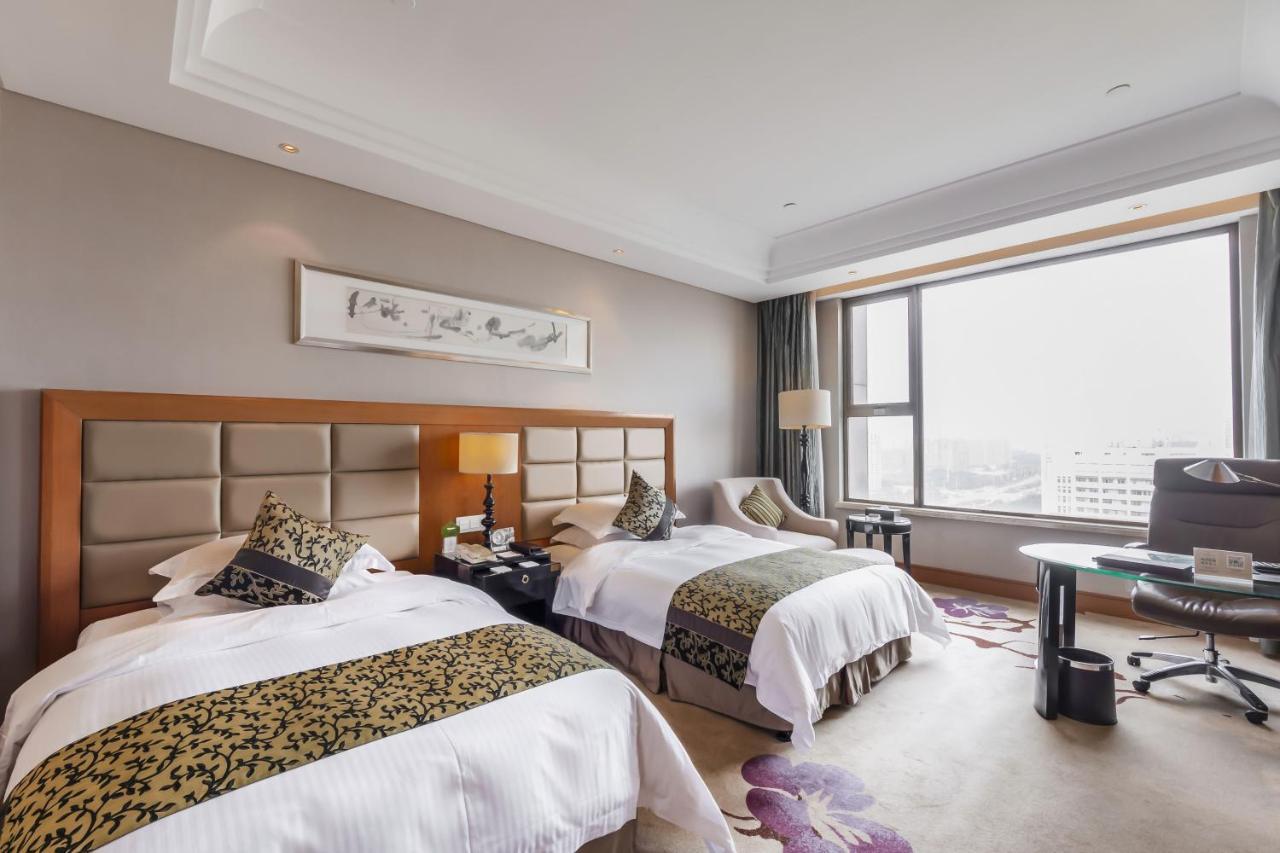 מלון Wyndham Xinyang Downtown מראה חיצוני תמונה