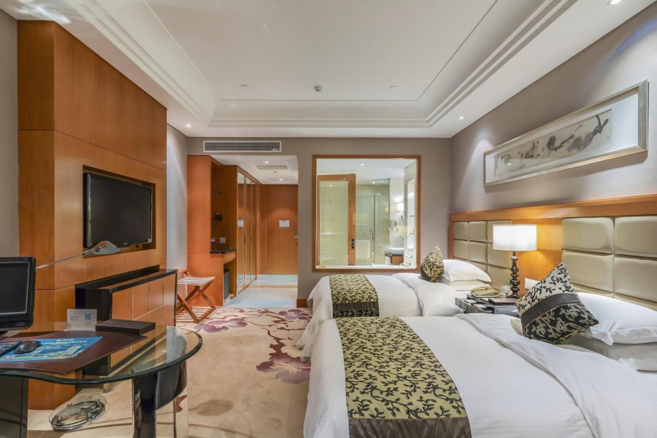 מלון Wyndham Xinyang Downtown מראה חיצוני תמונה