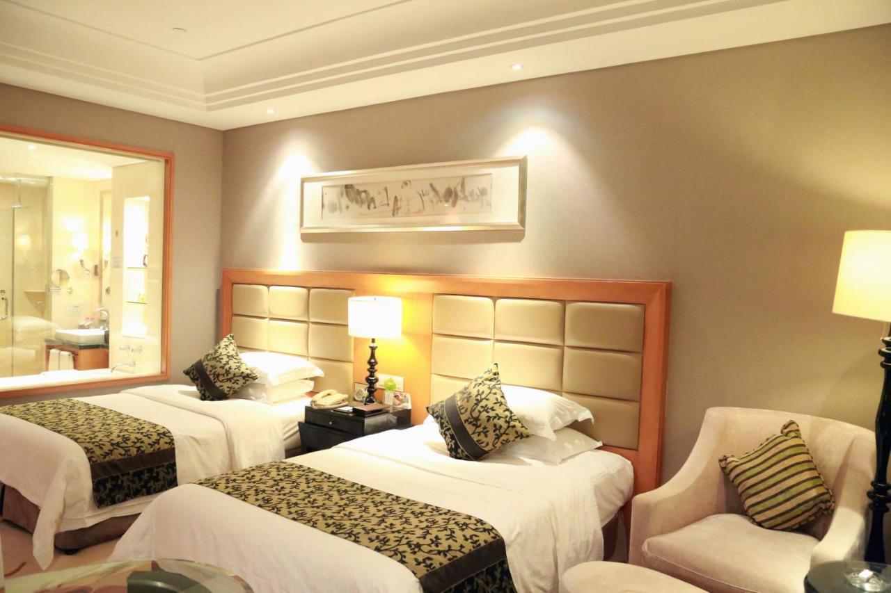 מלון Wyndham Xinyang Downtown מראה חיצוני תמונה